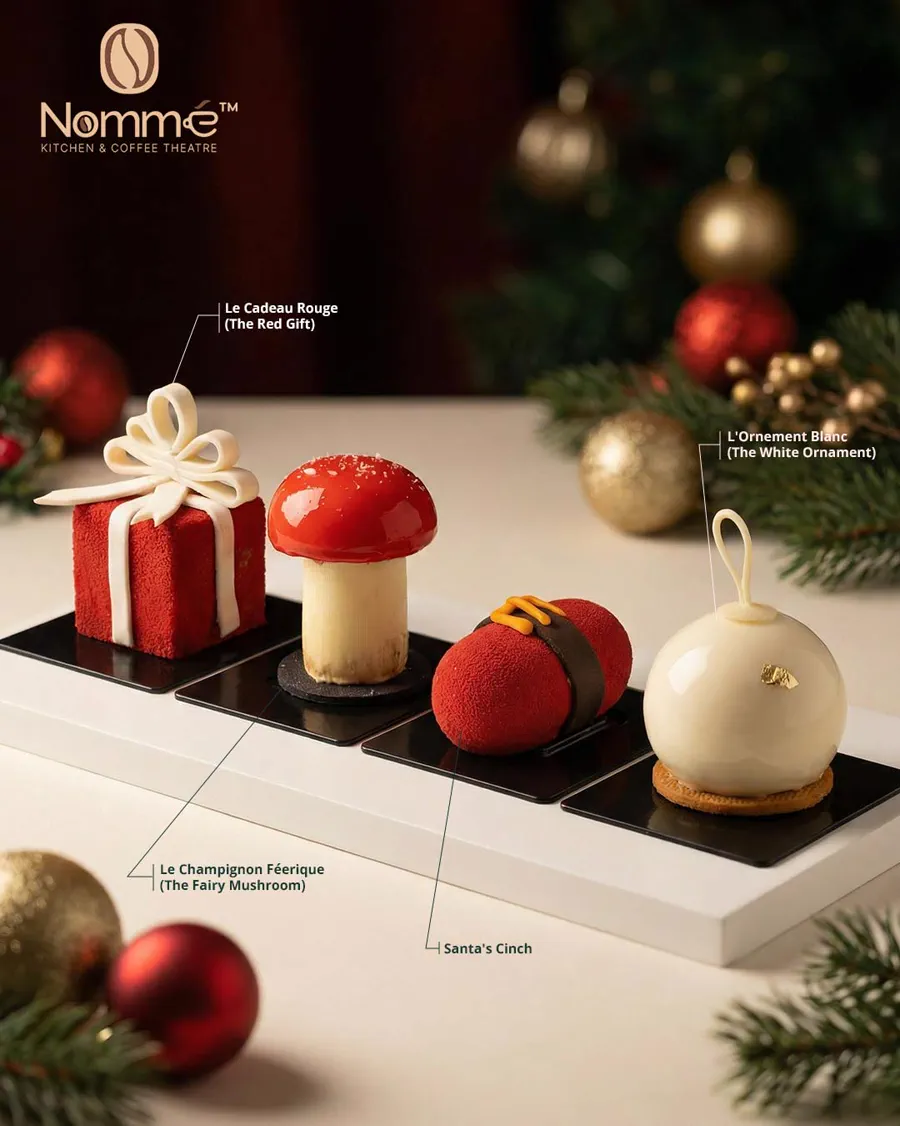 Christmas patisserie post — four entremets on black plates, each labelled with a leader line giving its French name and English translation